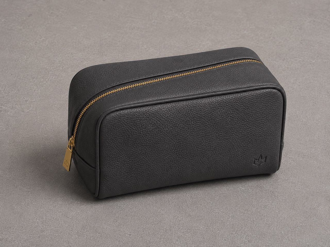 The Toiletry Case — open, contents spilling out
